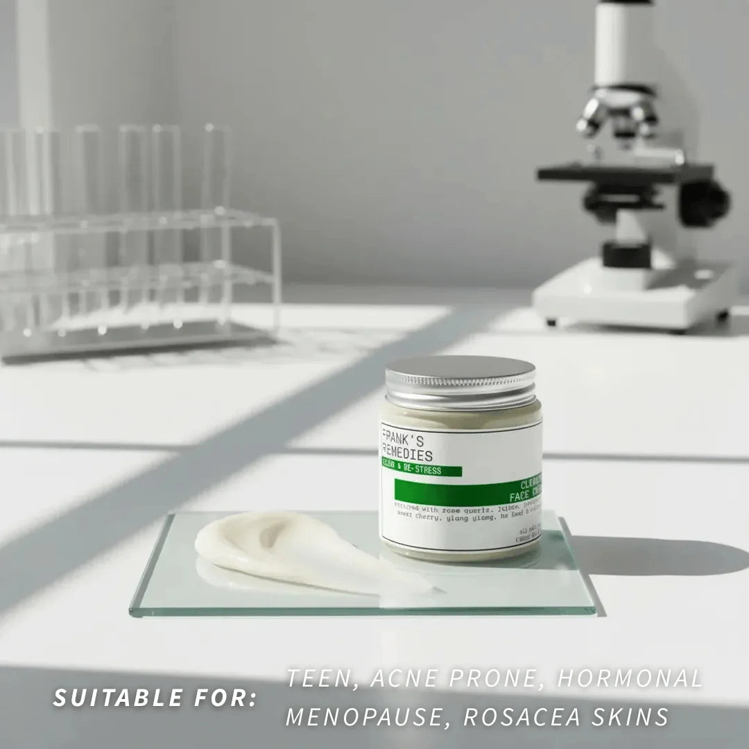 Clearing Face Cream on a glass surface with laboratory equipment in the background